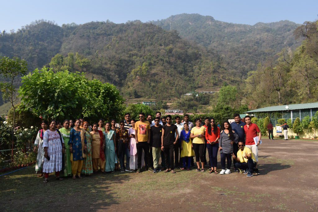 Corporate Group Package with outdoor team-building games, adventure activities, and bonding experiences in a scenic natural camp setting.