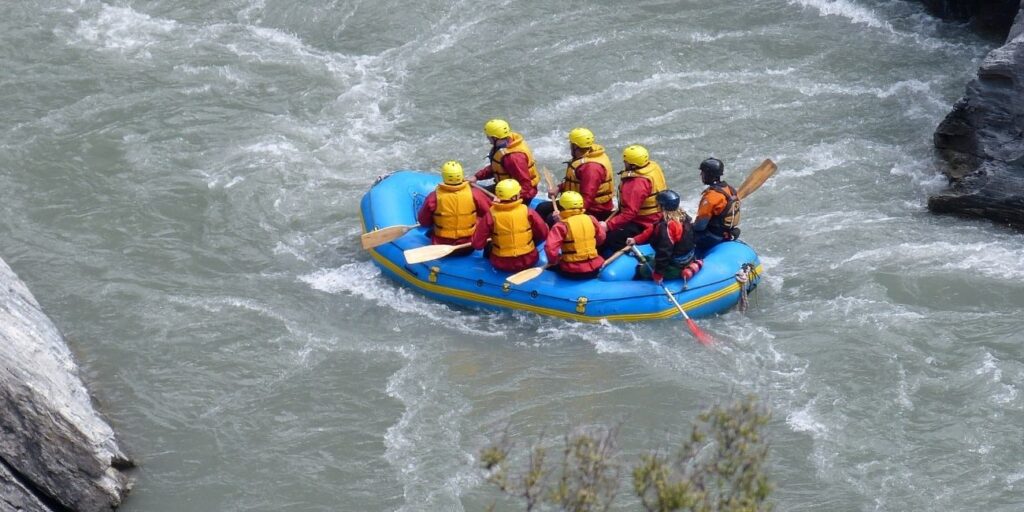 Adventure Packages with river rafting, trekking, camping, zip-lining, and other outdoor activities in scenic natural landscapes.